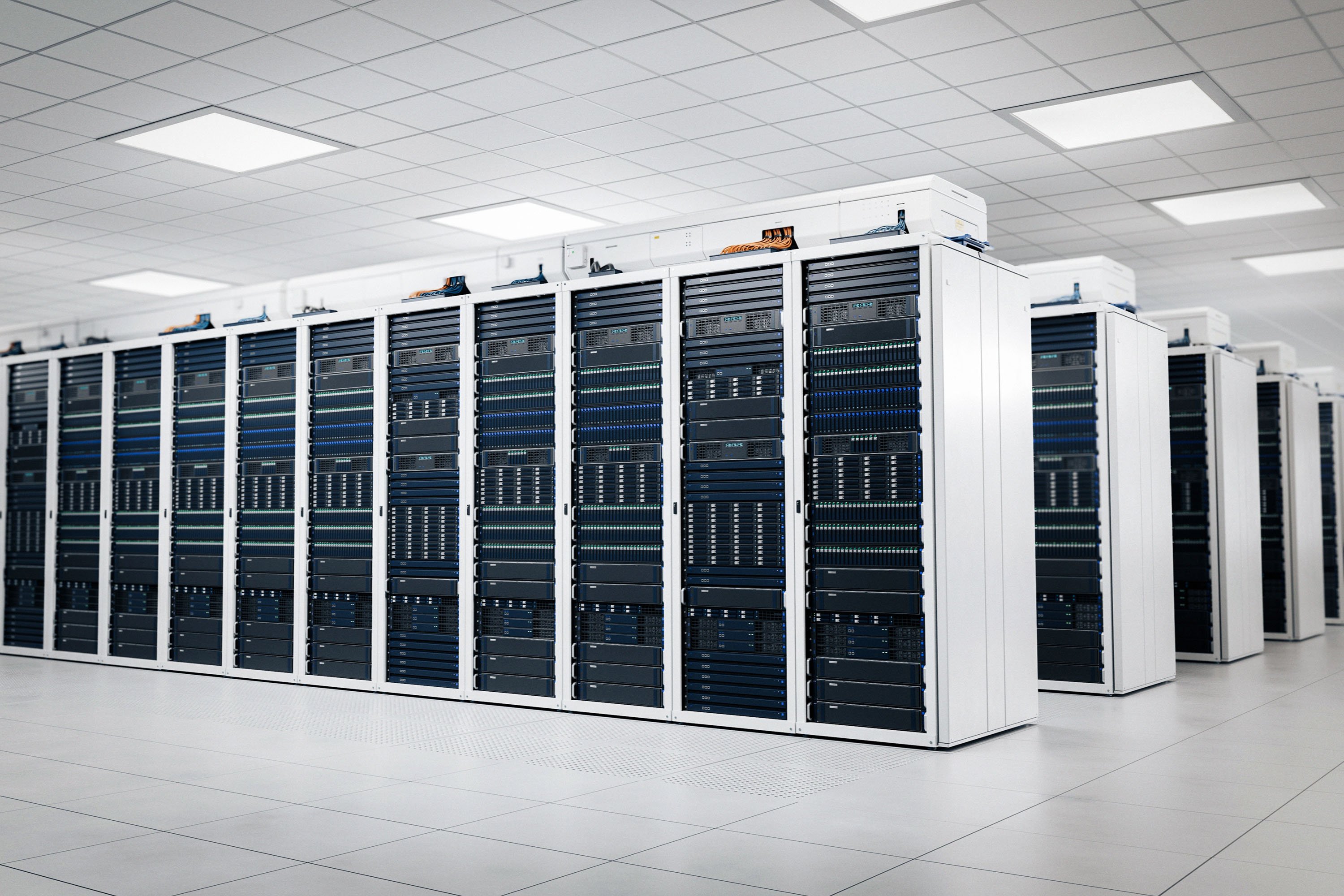 Several rows of data center cabinets in a data center environment.