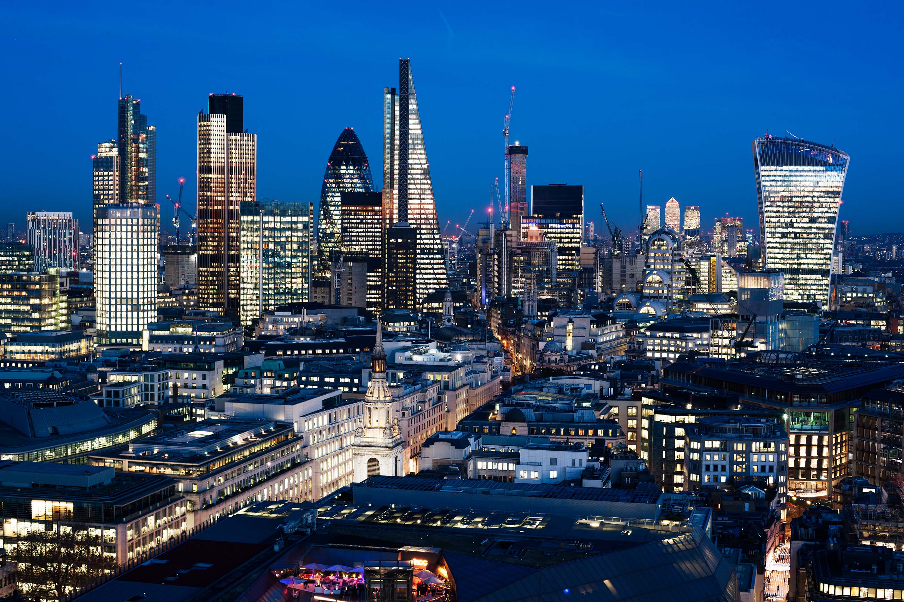 Aerial veiw of the financial district of London at night.